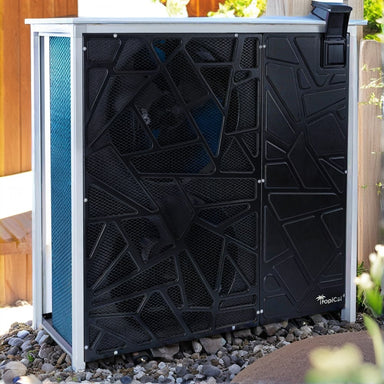 Black T130 heater with geometric design on a gravel surface.